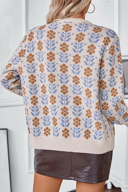 Langærmet strikket sweater med blomsterknapper 