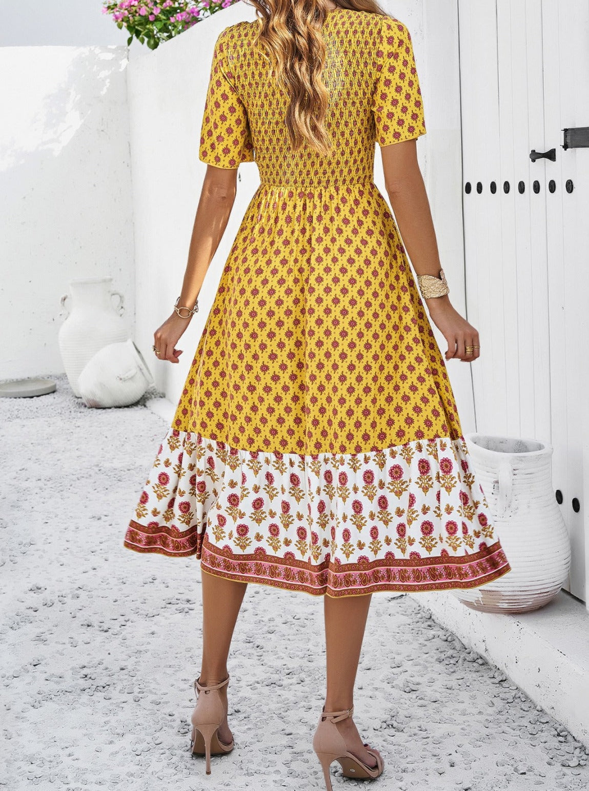 Elegant solkjole med retro-blomstret print